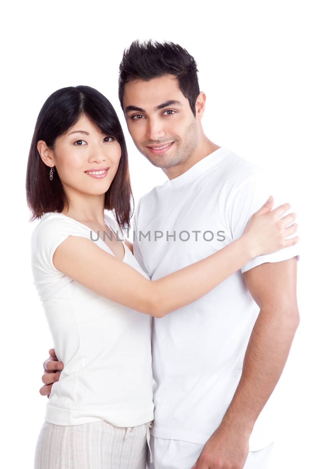 Portrait of diverse young couple isolated on white background.