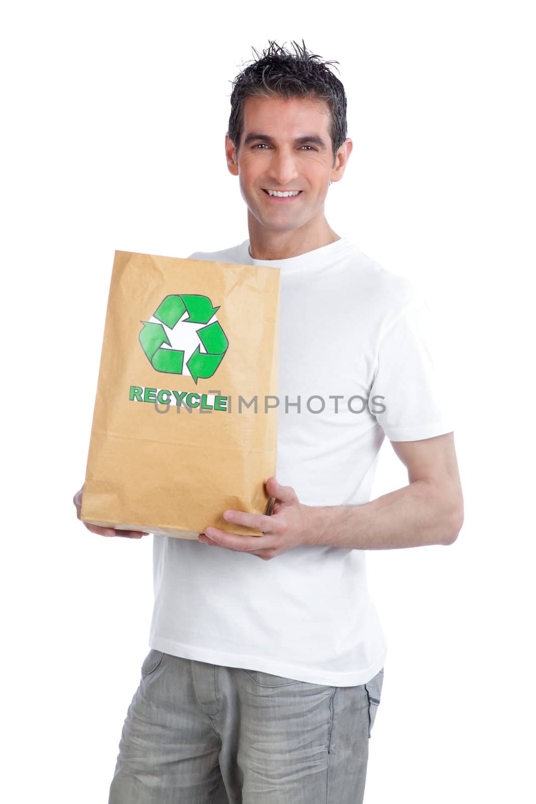 Young happy man holding shopping paper bag.