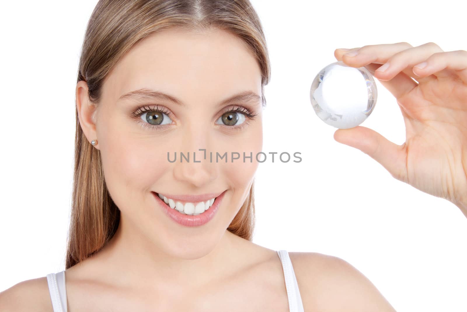 Young happy woman holding crystal ball isolated on white background.
