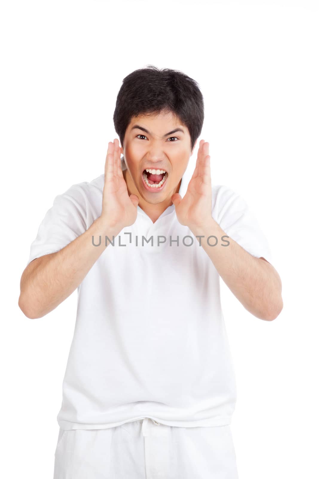 Young asian man yelling isolated on white background.