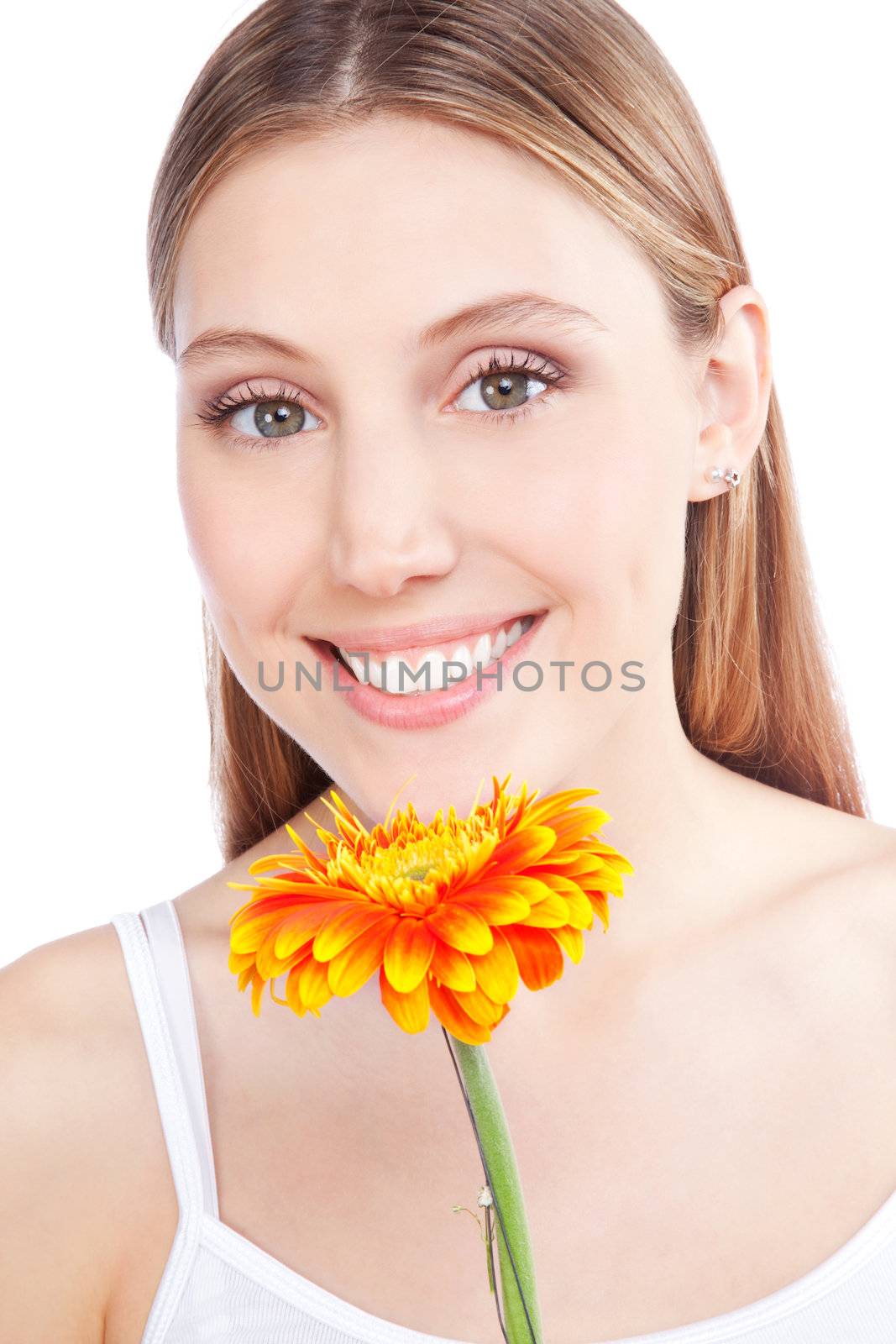 Young happy woman holding gerbera flower isolated on white background.