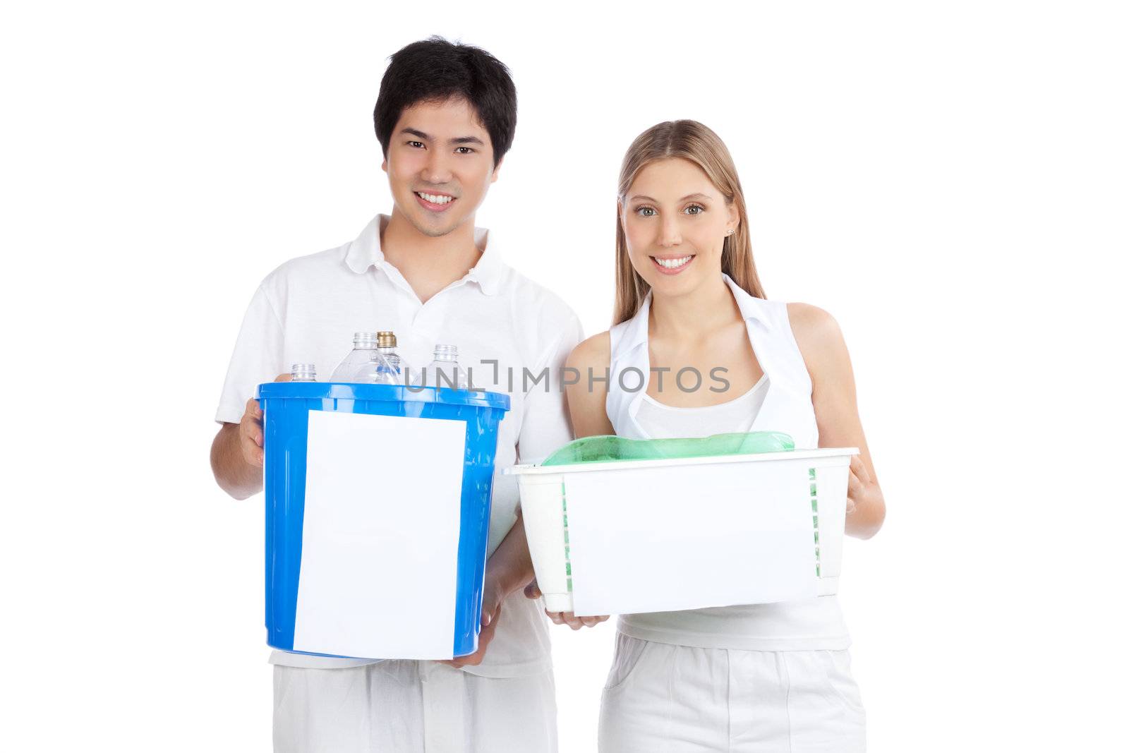 Portrait of young happy couple holding recycle bin .