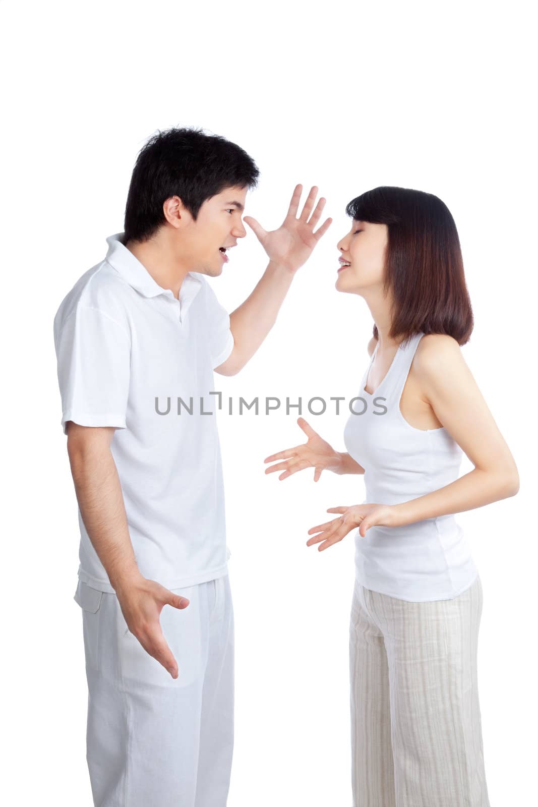 Angry couple arguing isolated on white background.