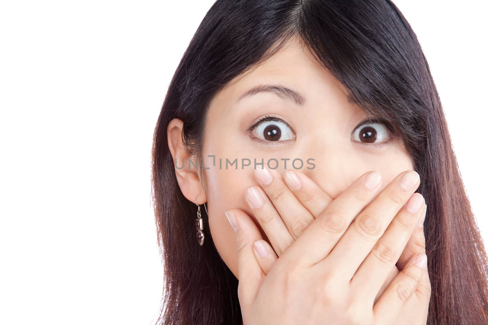 Surprised asian woman covering her mouth by the hands isolated on white background.