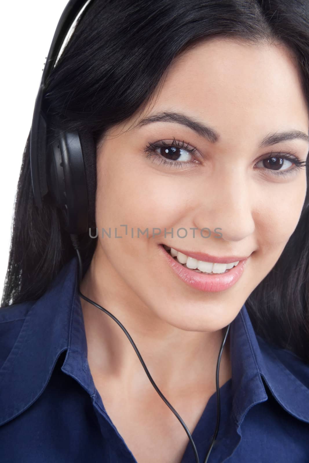 Close-up of woman listening music on headphone isolated on white background.