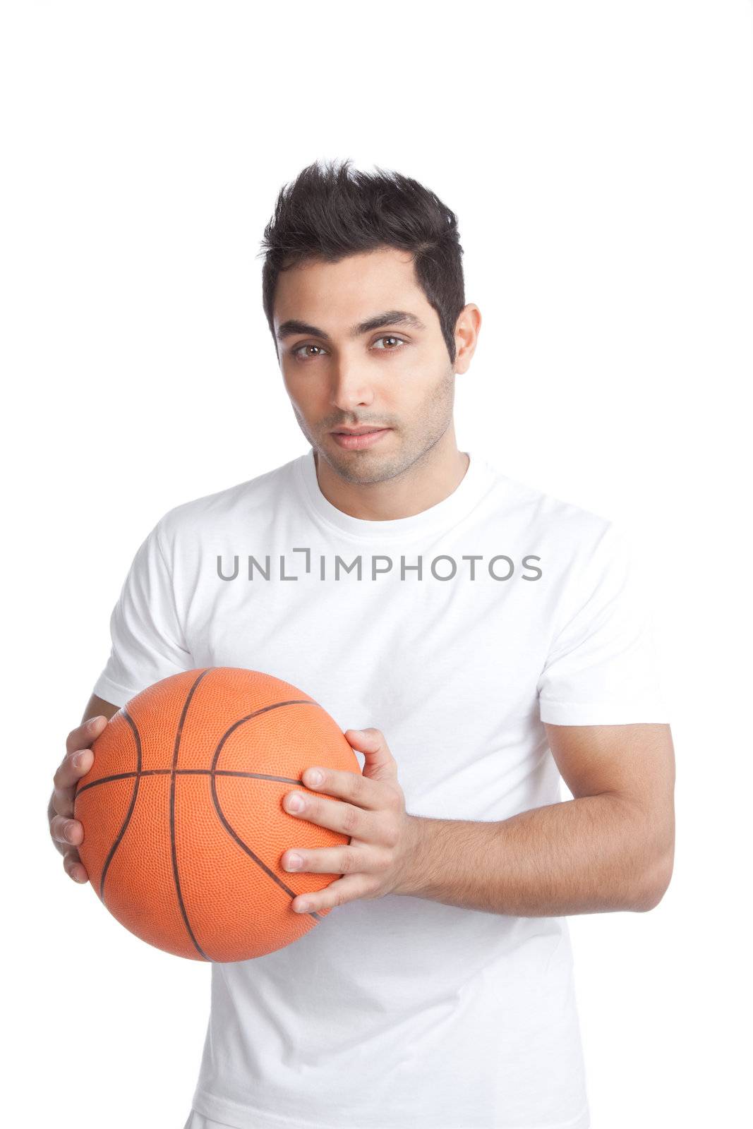 Portrait of young man holding basketball isolated on white background.
