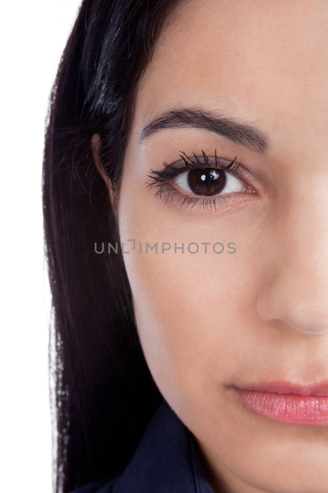 Close-up of beautiful woman face isolated on white background.