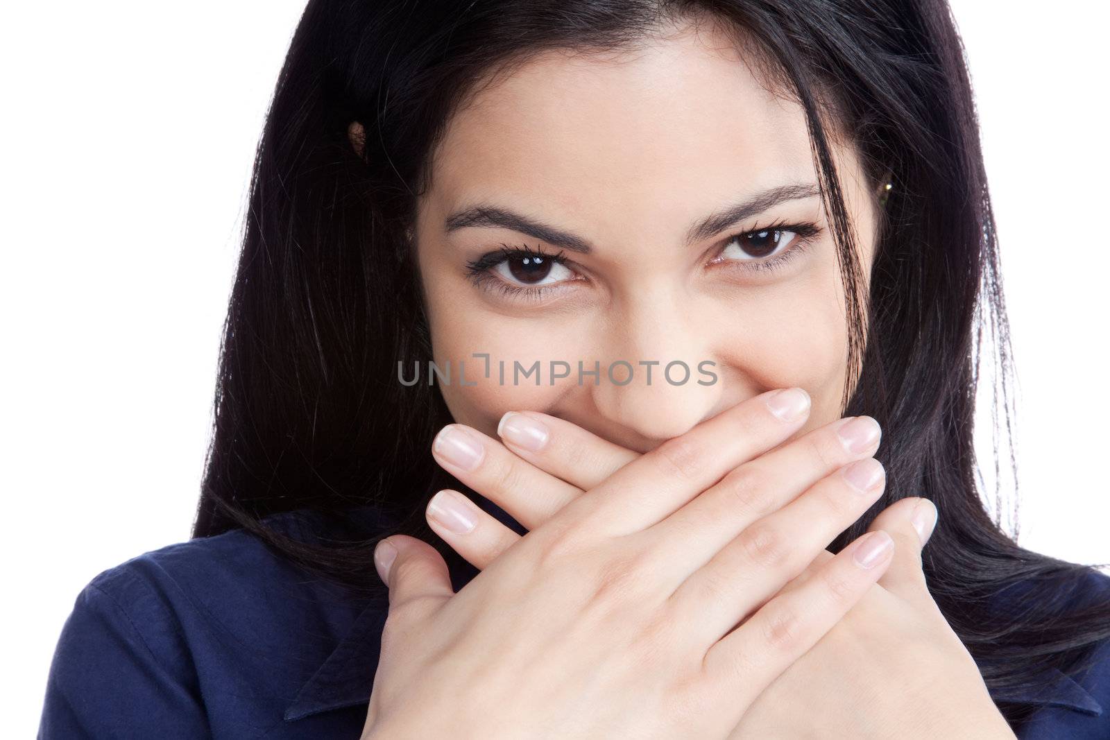 Portrait of happy young woman covering mouth isolated on white background.
