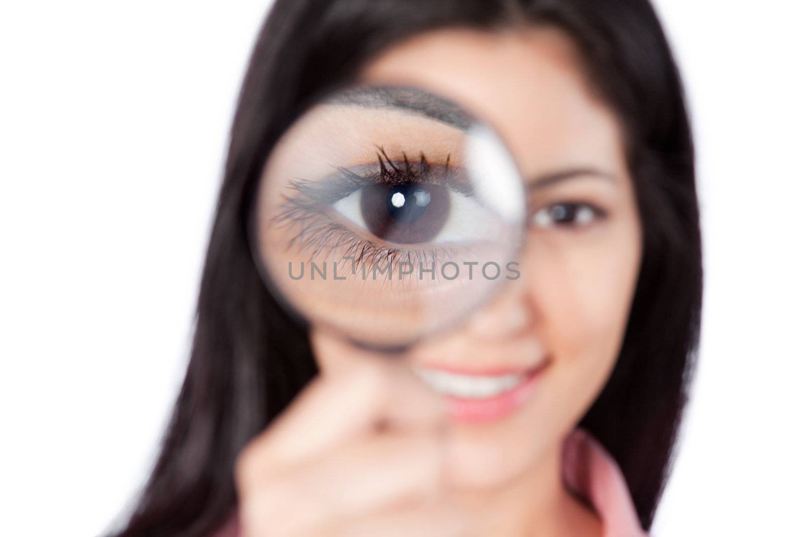 Woman Holding Magnifying Glass by leaf