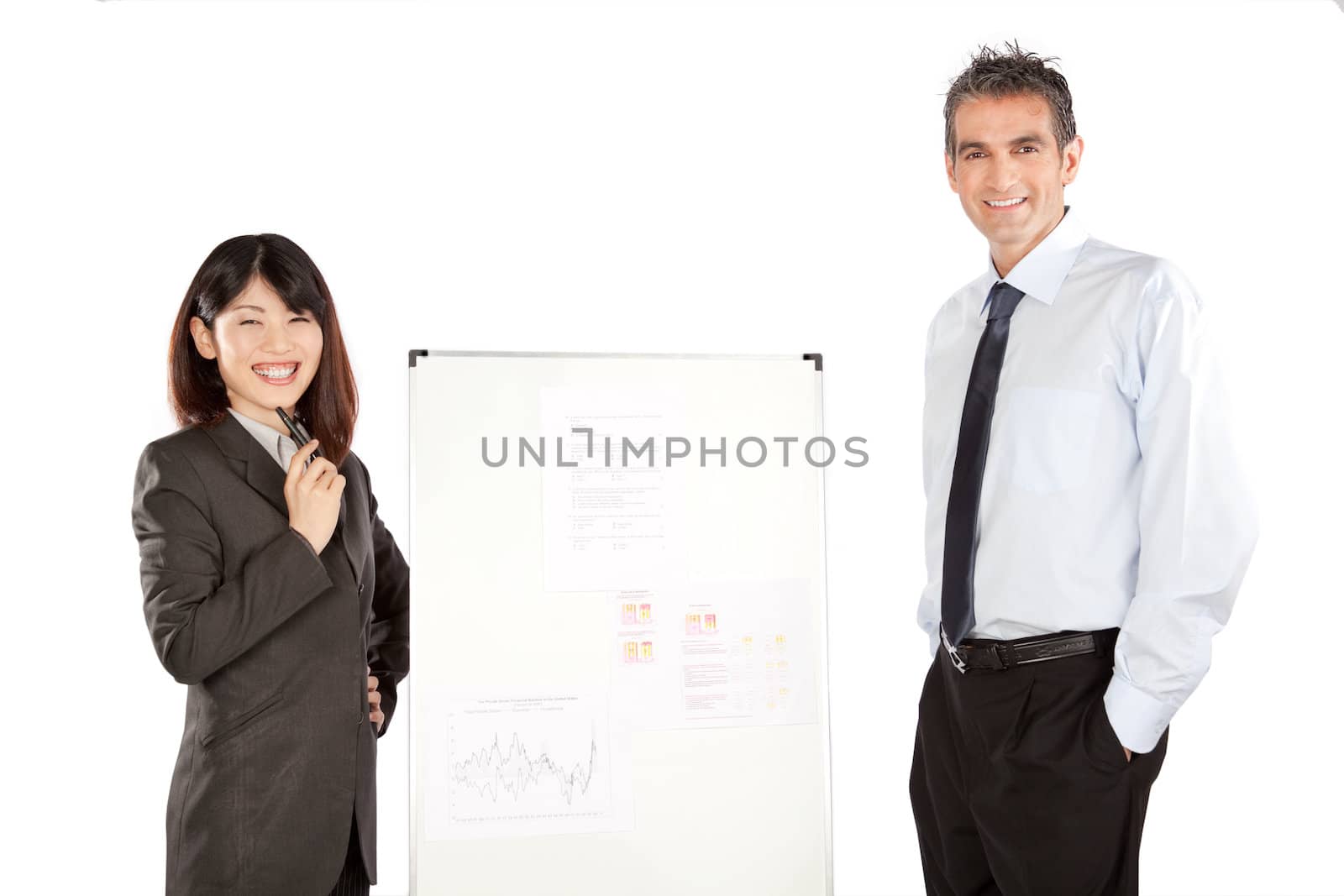 Smiling businesswoman and businessman giving a presentation in business.