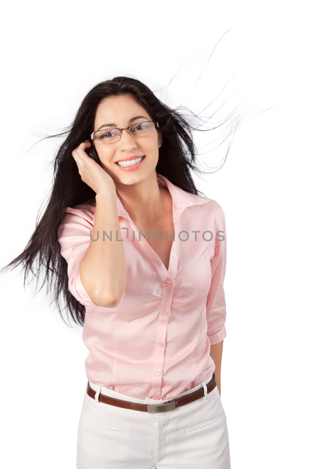 Portrait of young woman talking on smart phone isolated on white background.