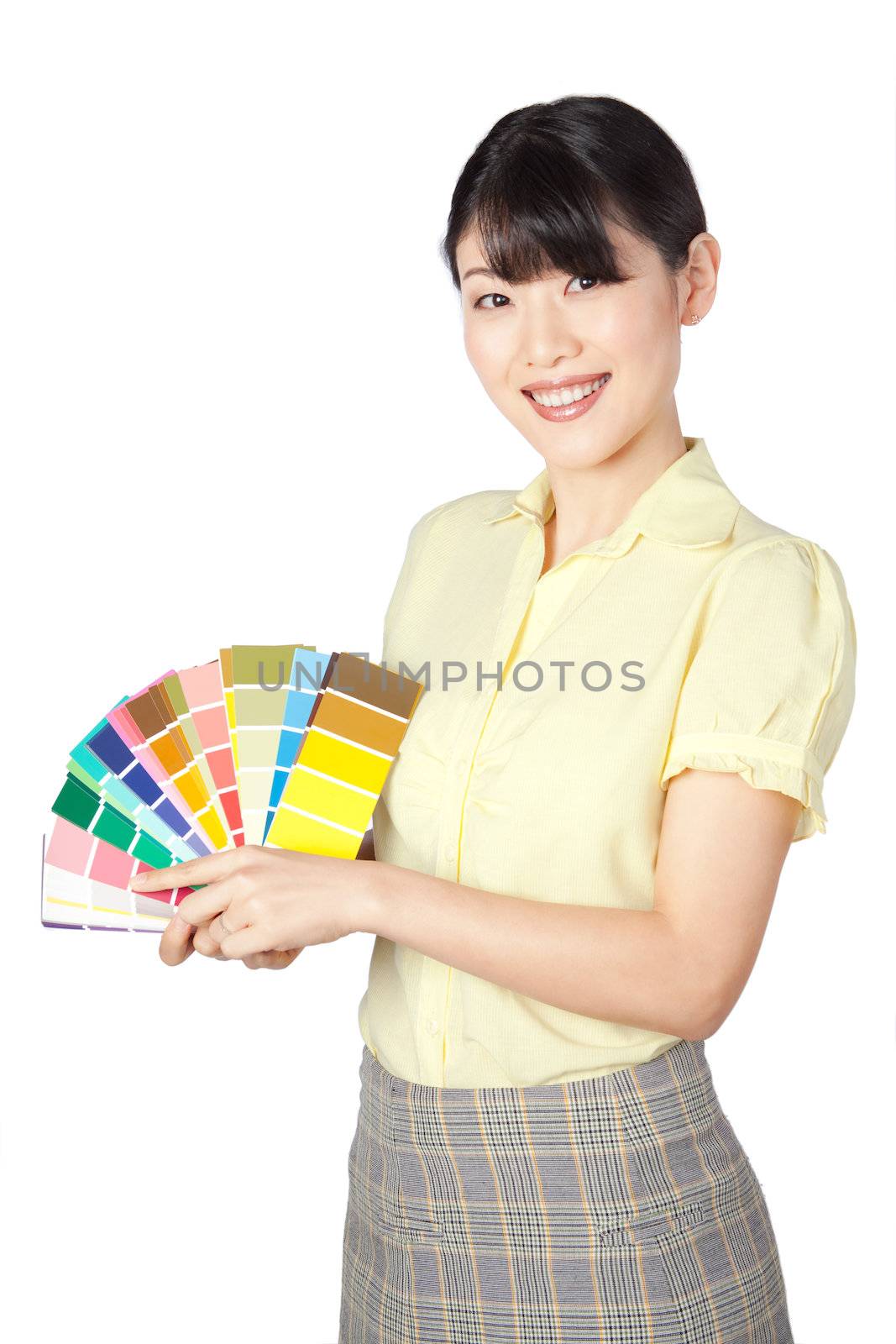 Young Woman Showing Color Chart by leaf