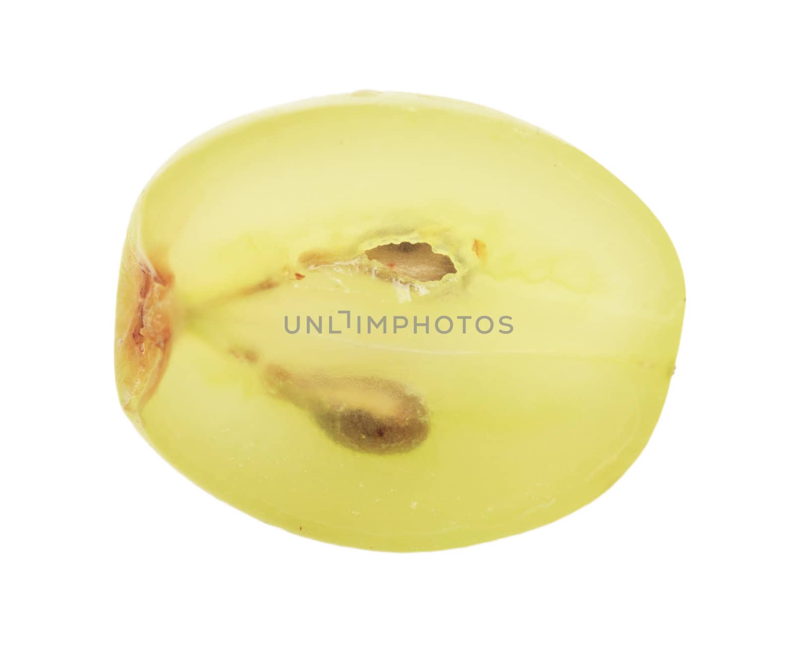 Translucent slice of green grape fruit, macro isolated on white 