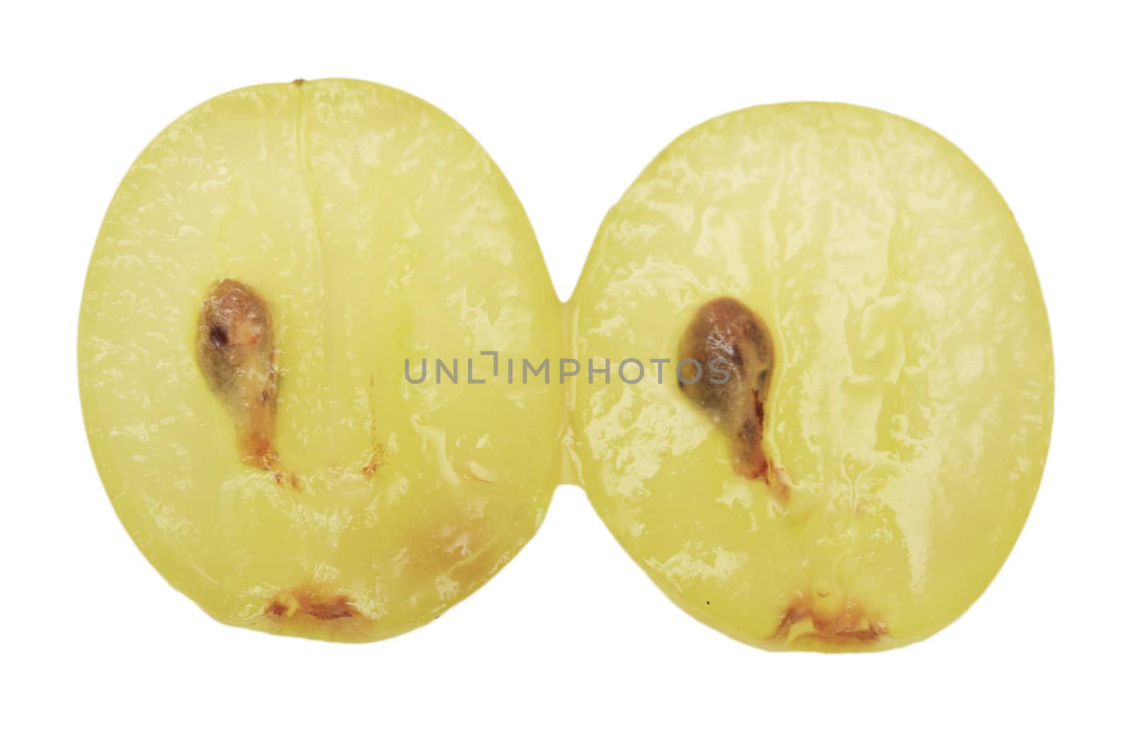 Translucent slice of green grape fruit, macro isolated on white 