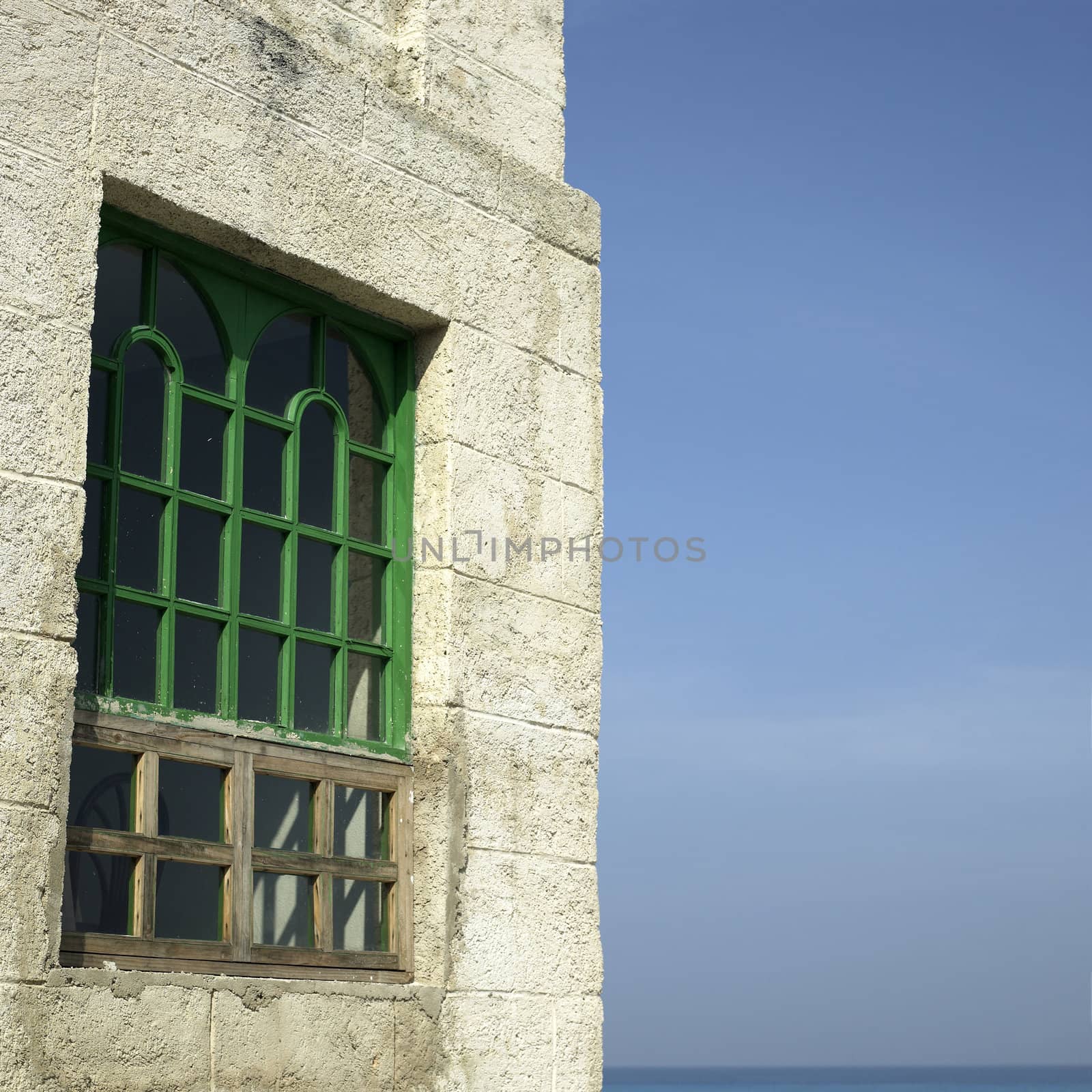 Old tropical villa made of stone blocks
