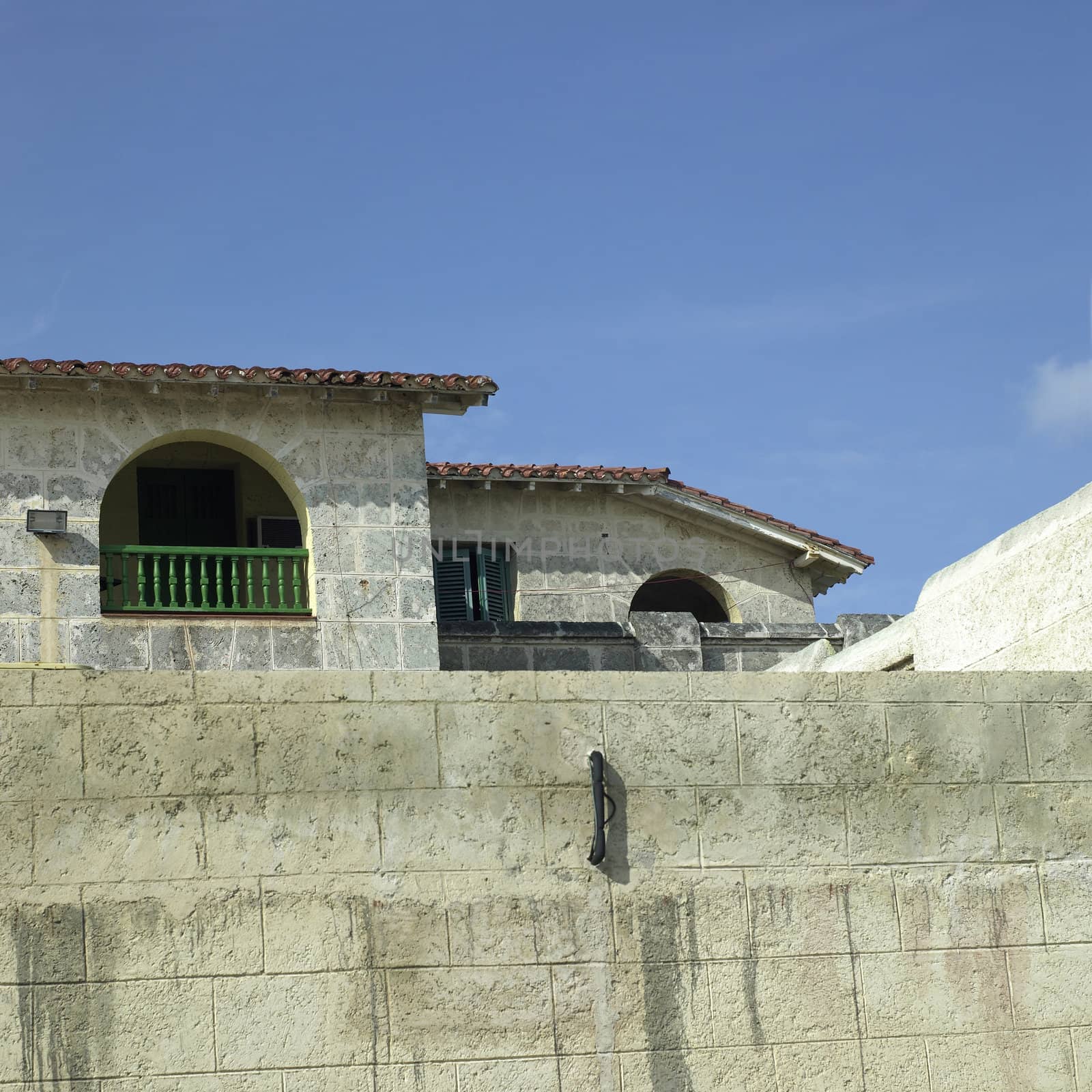 Old tropical villa made of stone blocks