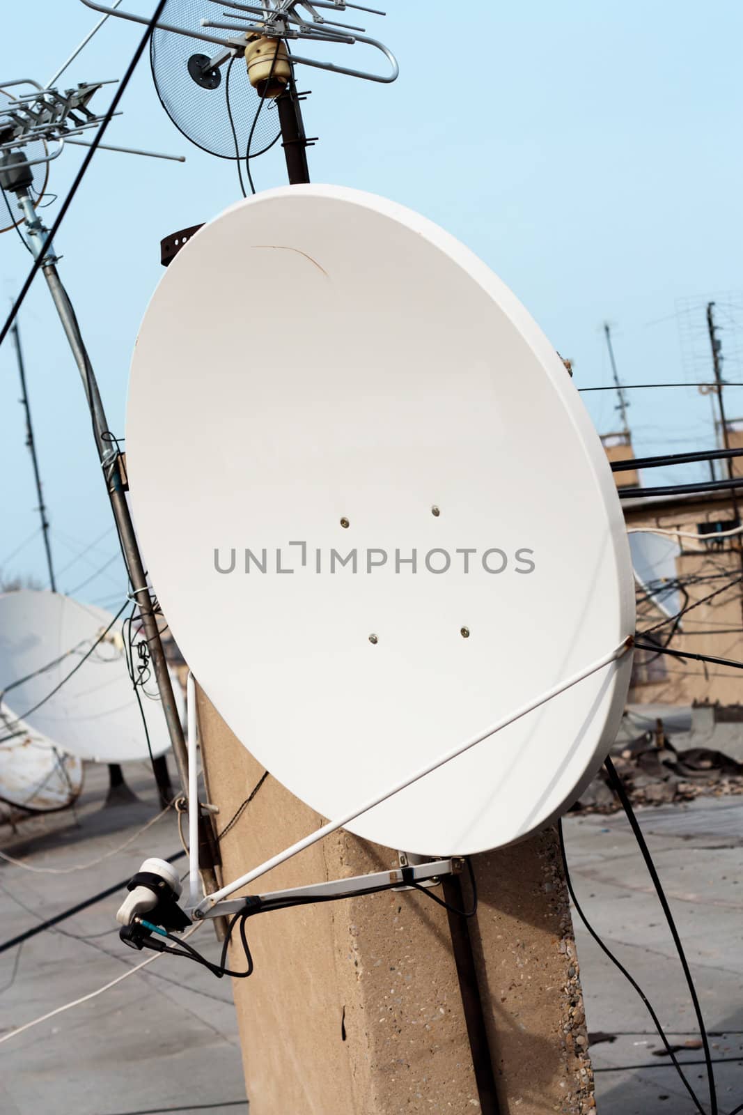 Satellite dish with sky on roof  by schankz