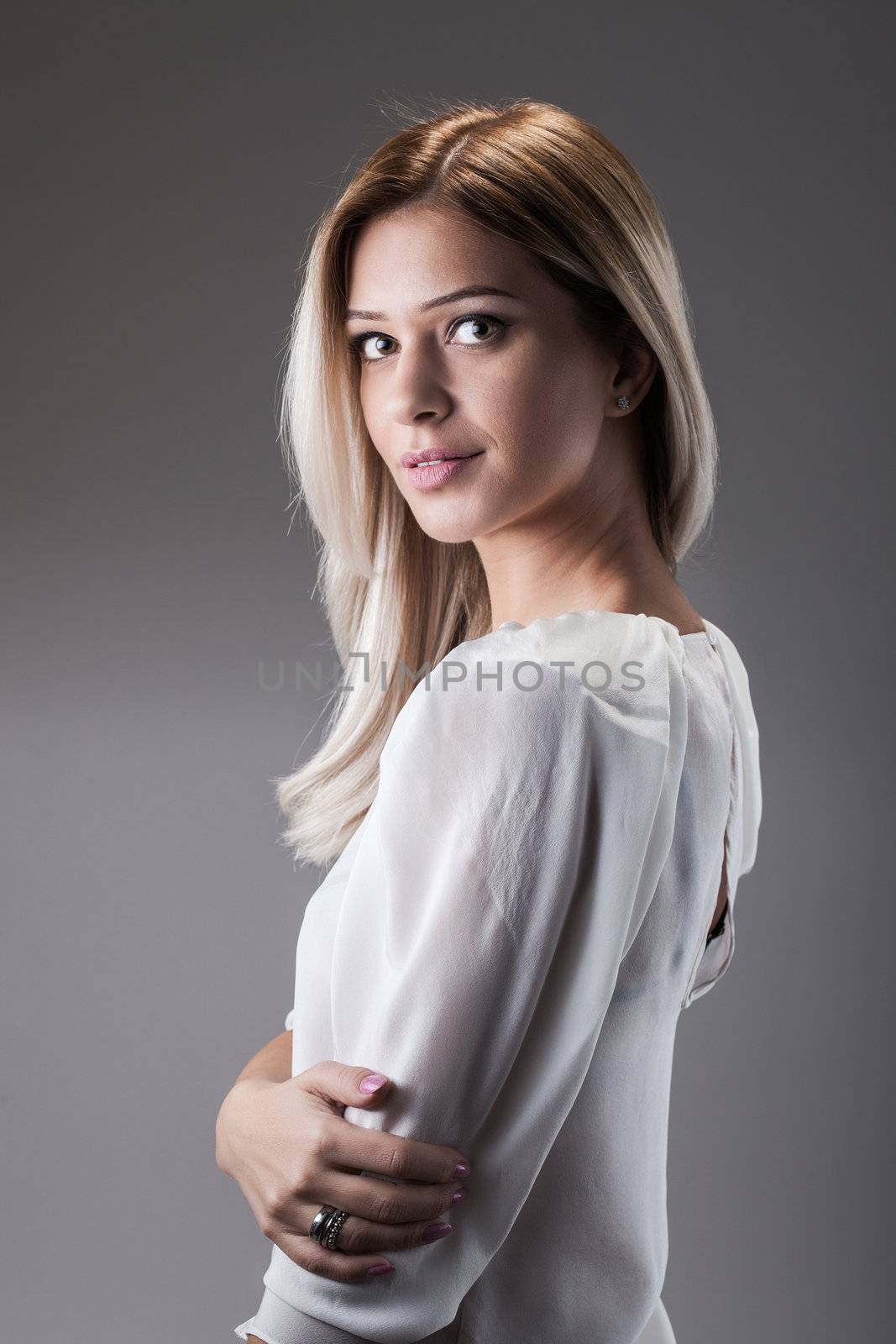 portrait of attractive caucasian girl with shiny blond hair