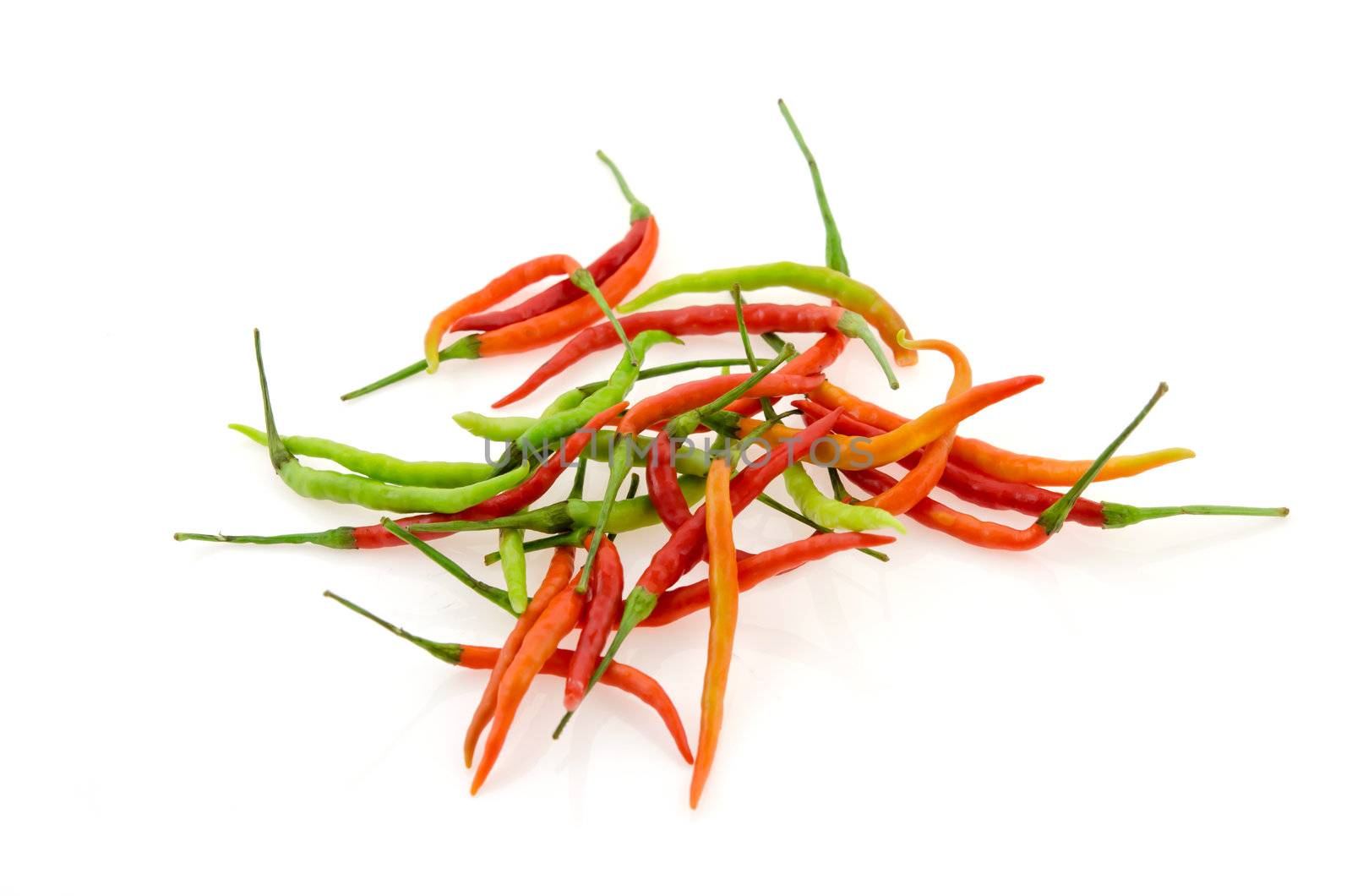 fresh green chili , red chili , yellow chili over white background 