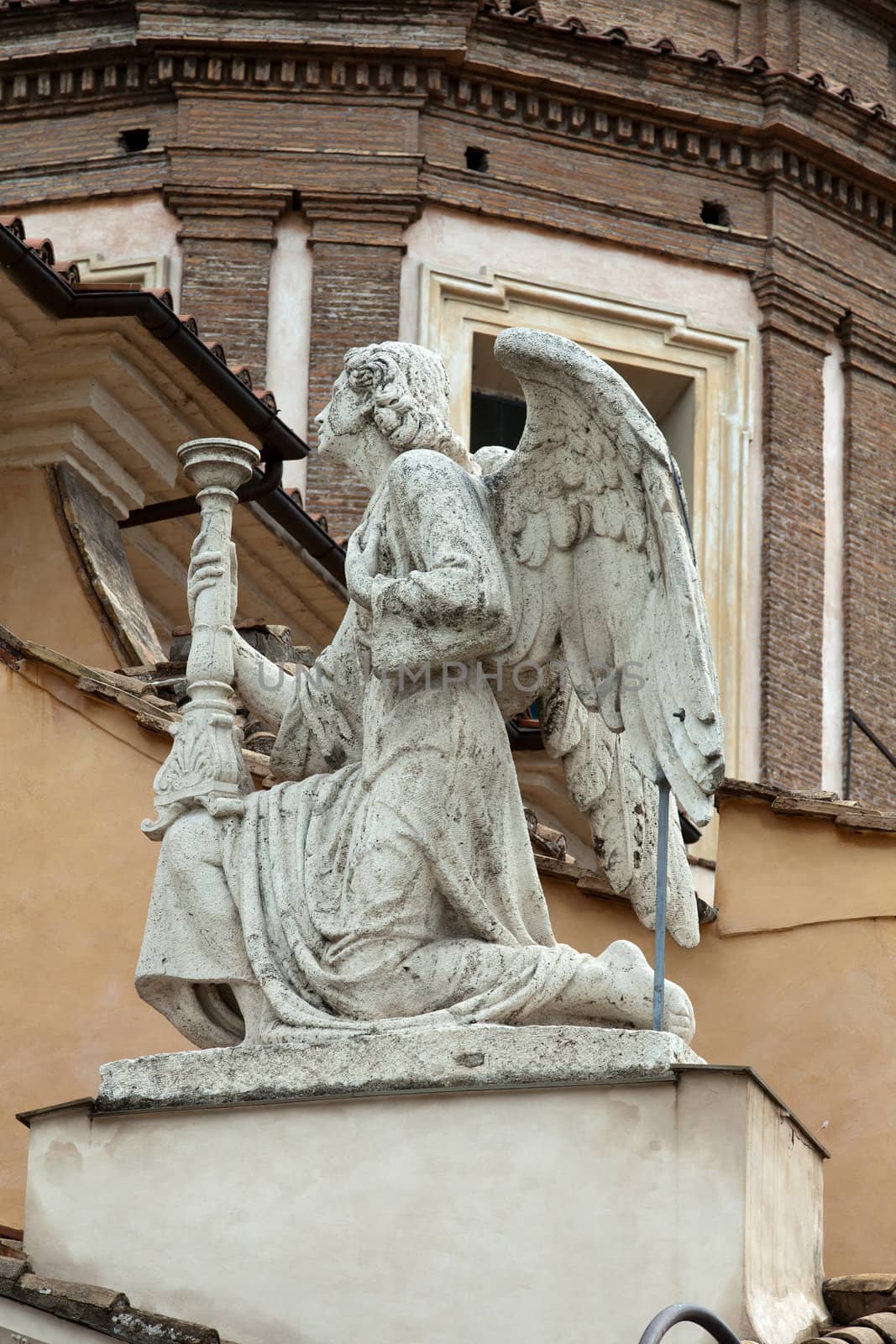 Rome - the angel on the façade of the church of San Rocco