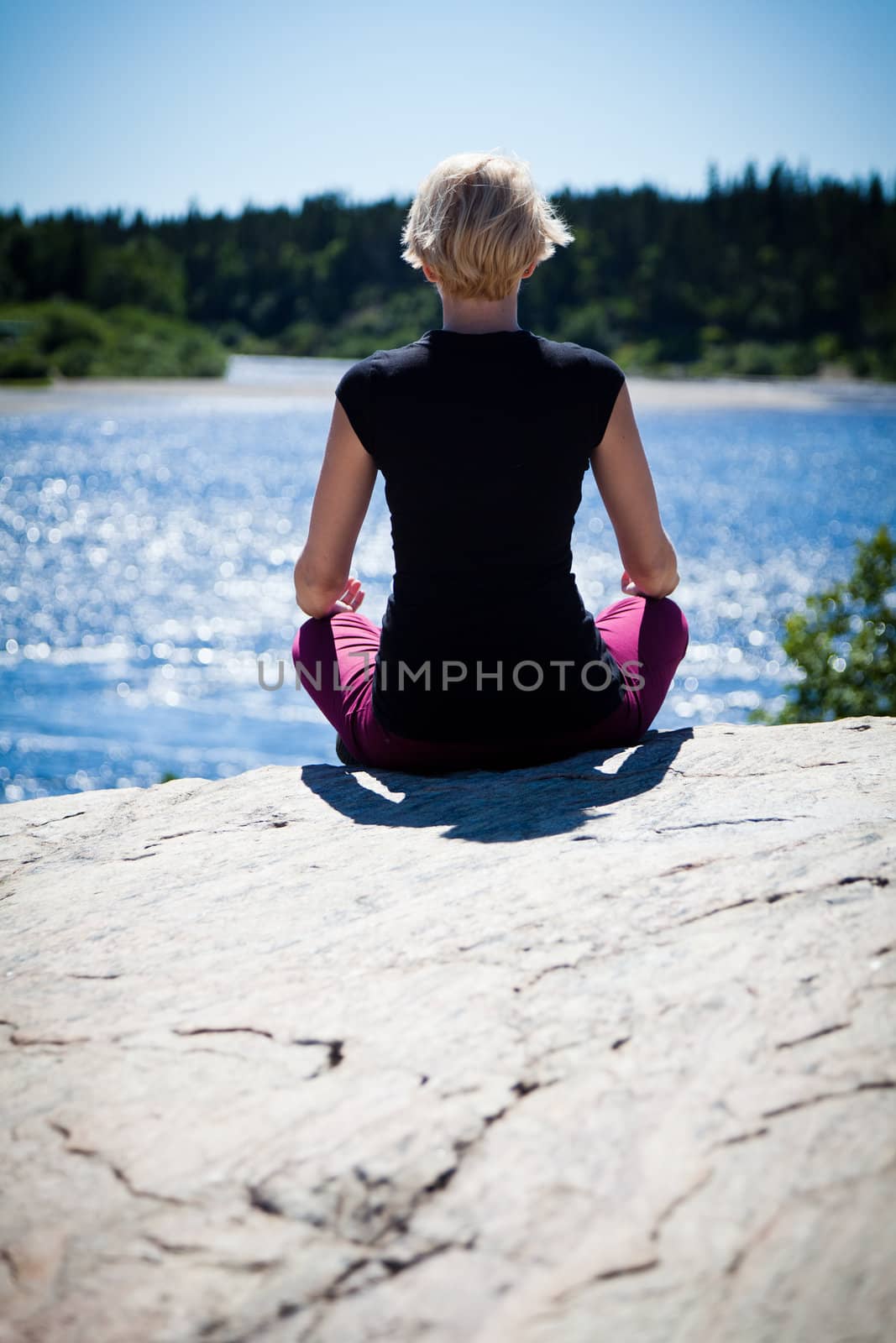 Yoga in nature with a young girl