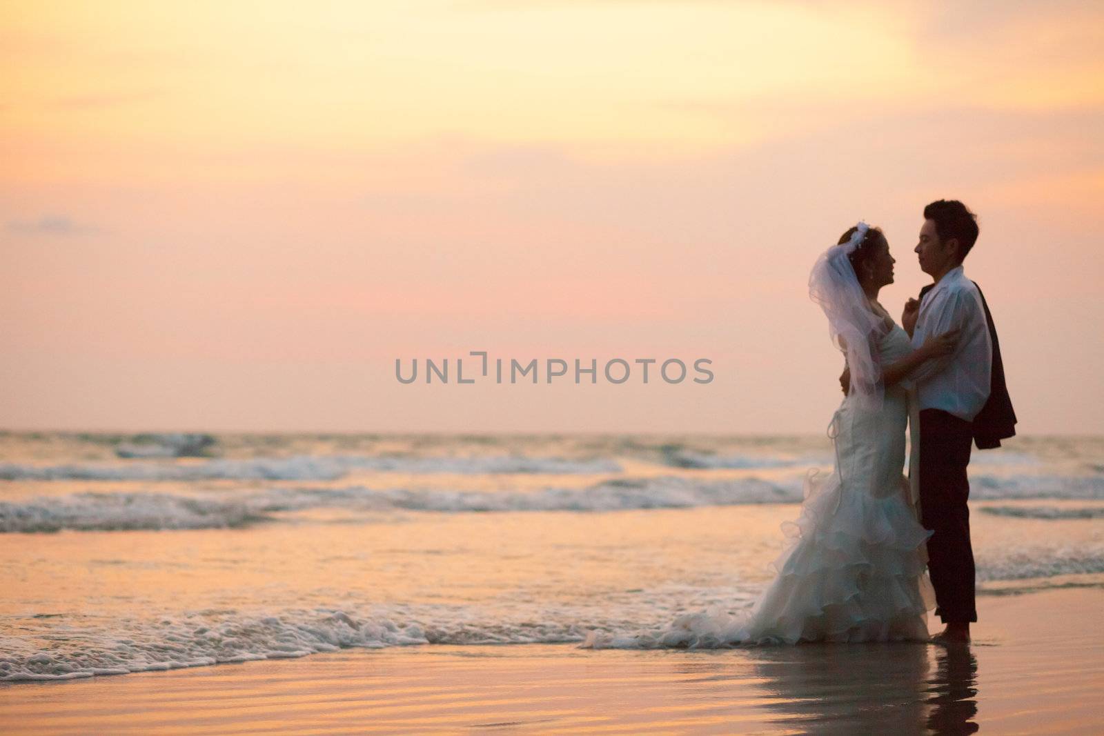 happiness and romantic Scene of love couples partners wedding on the Beach