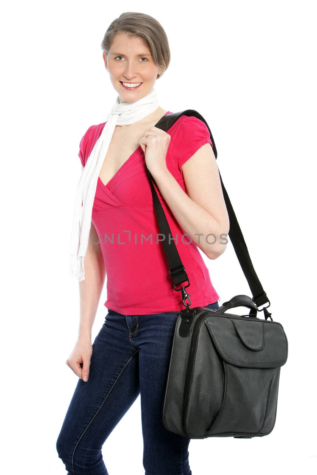 Young attractive woman carrying a laptop shoulder bag smiling at the camera.