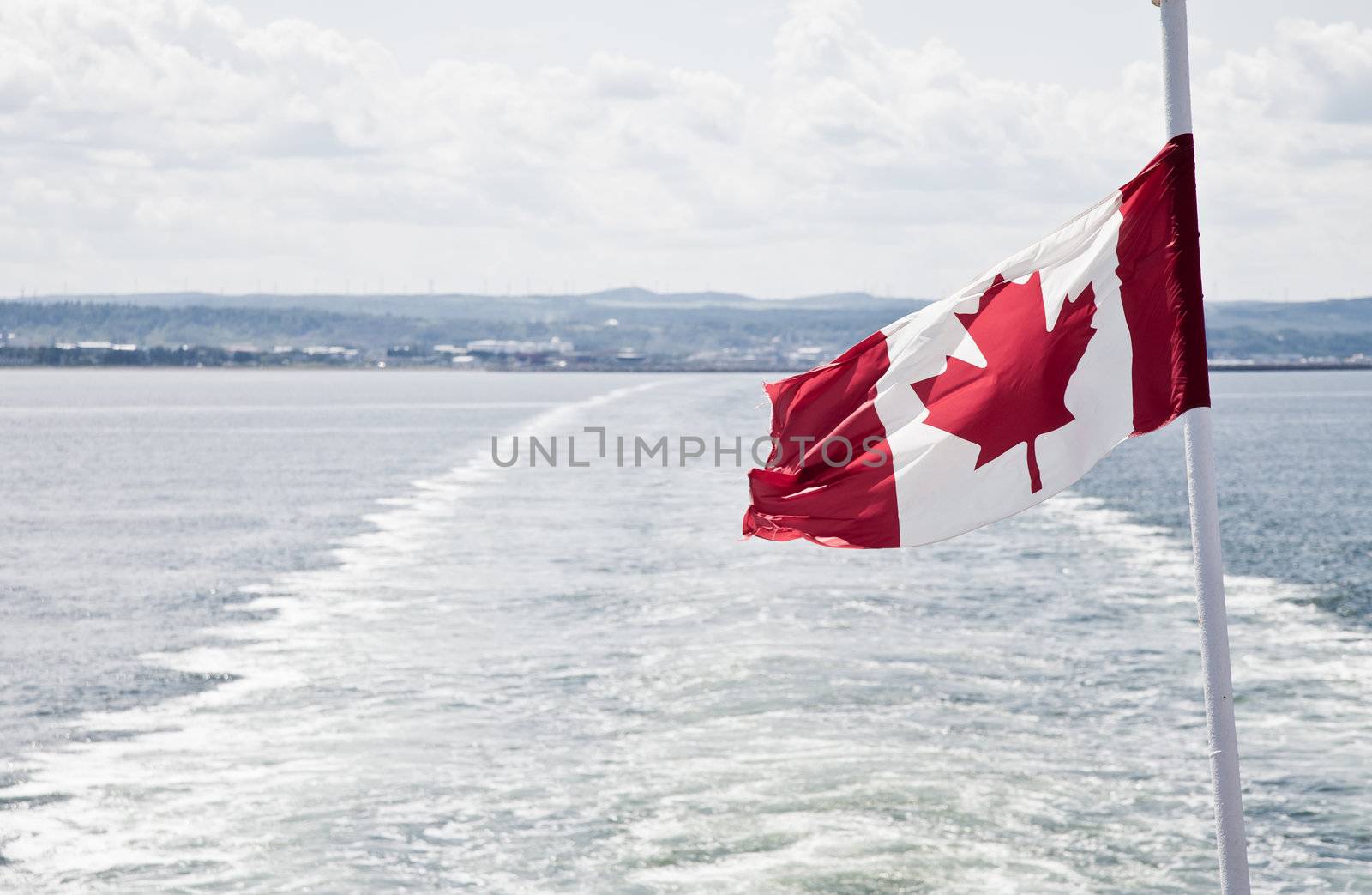 View of the sea and the flag of Canada