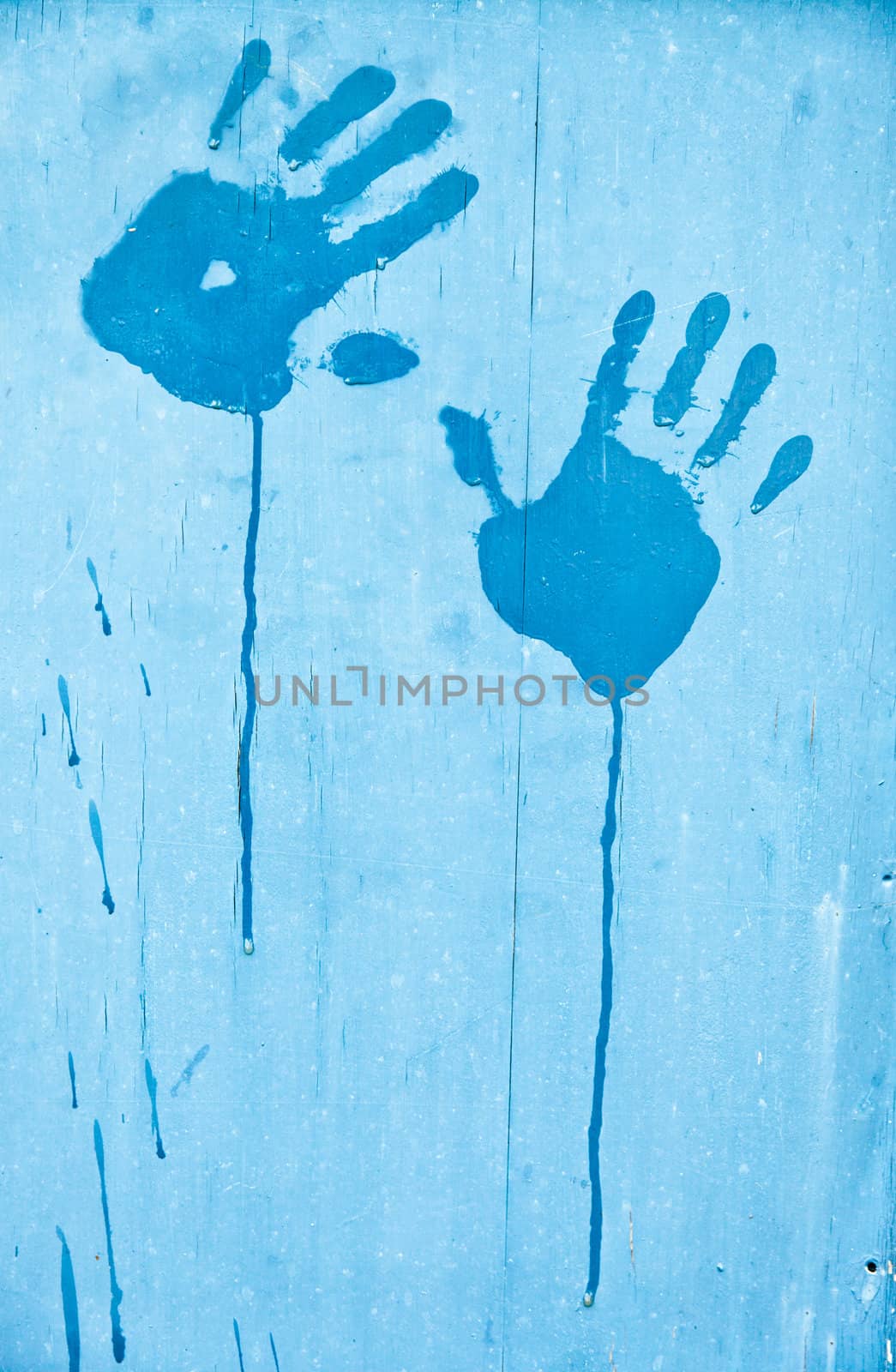 Fingerprints of blue paint