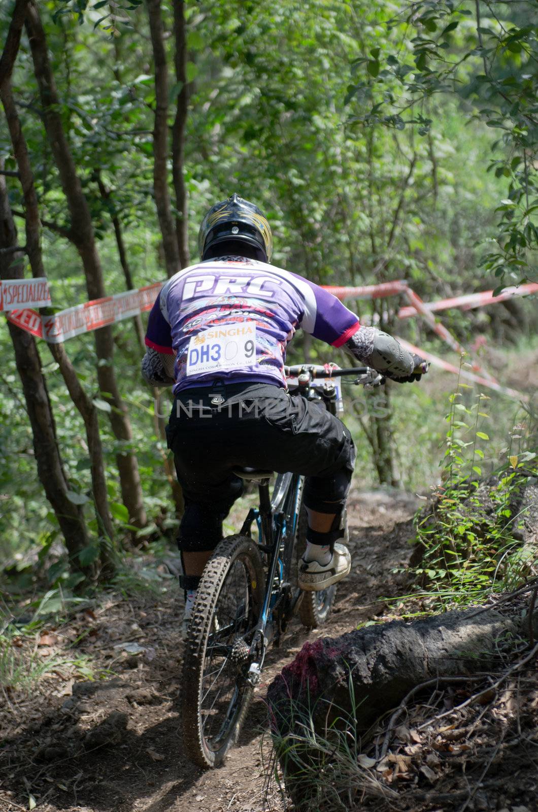 Hua Hin,Thailand - December 1st : Unidentified bicycle racing downhill competitors during the "Hua Hin mountain bike racing 2012  " at Hinlekfai mountain on December 1st, 2012 in Hua Hin,Thailand. 