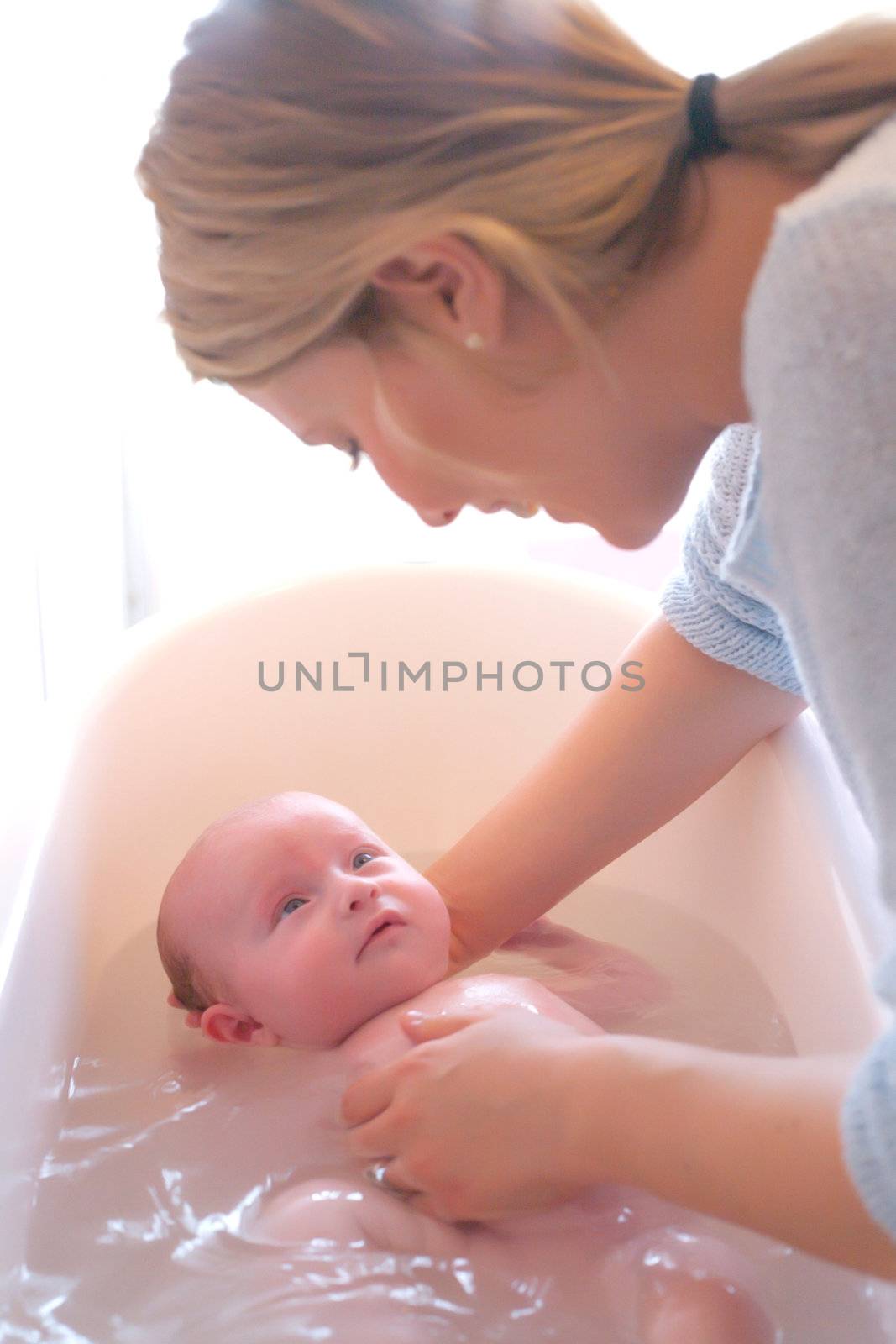 Happy baby in bath by DNFStyle