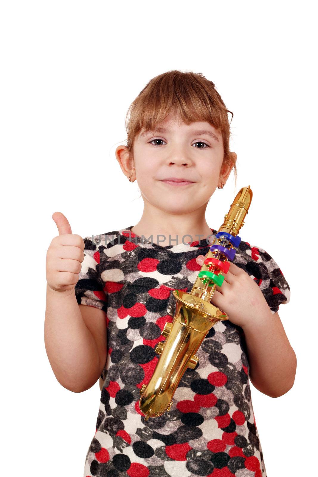 little girl with thumb up and saxophone