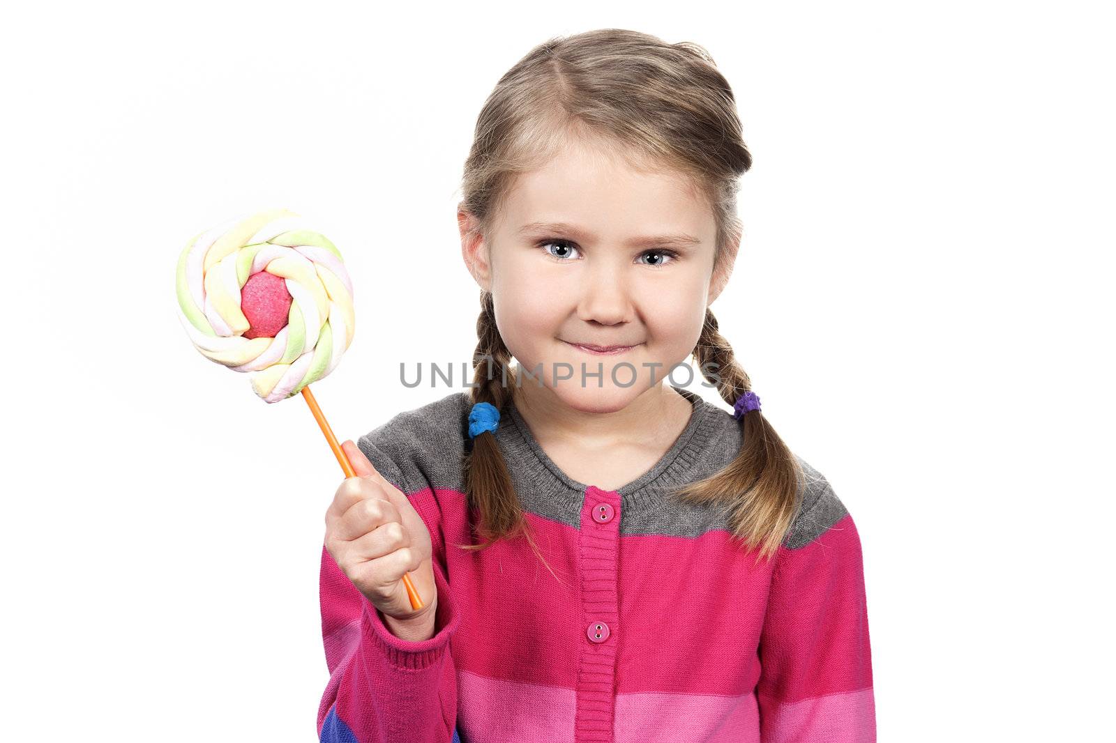 Cute girl with lollipop isolated on white background