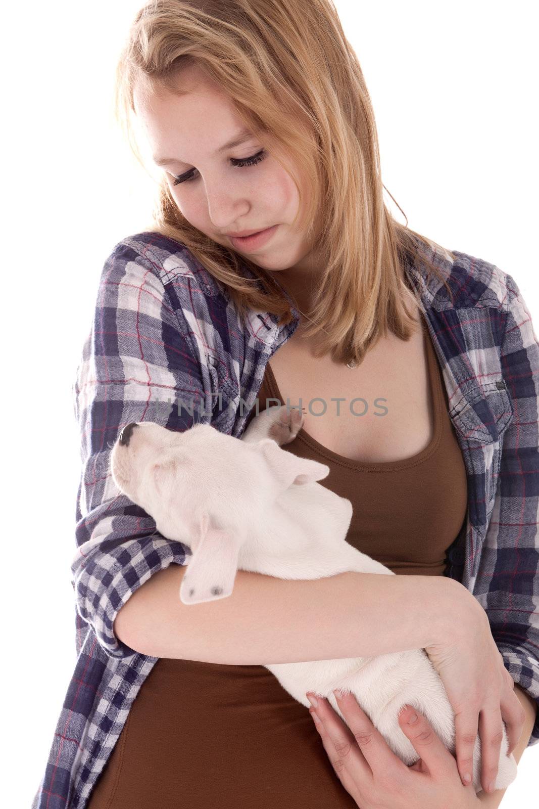 Young girl having a great time with the puppies