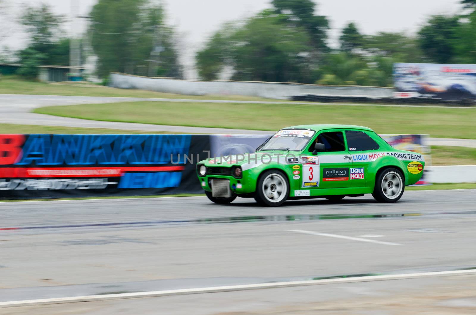 Nakhon Ratchasima, Thailand - March 9th:Unidentified car racing competitors during the "Thailand circuit 2013  " at Bonanza speedway on March 9th, 2013 in Nakhon Ratchasima, Thailand. 