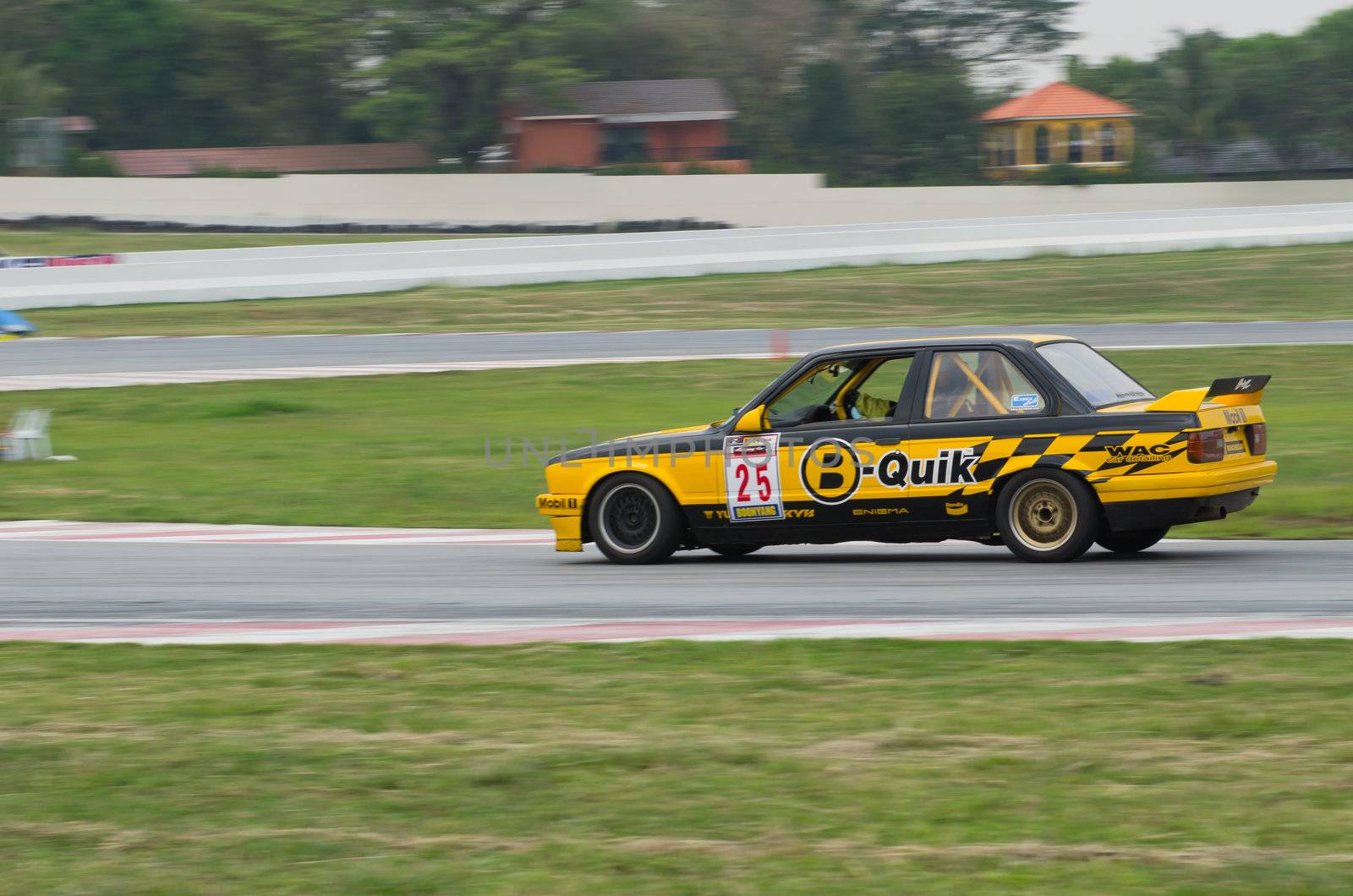 Nakhon Ratchasima, Thailand - March 9th:Unidentified car racing competitors during the "Thailand circuit 2013  " at Bonanza speedway on March 9th, 2013 in Nakhon Ratchasima, Thailand. 