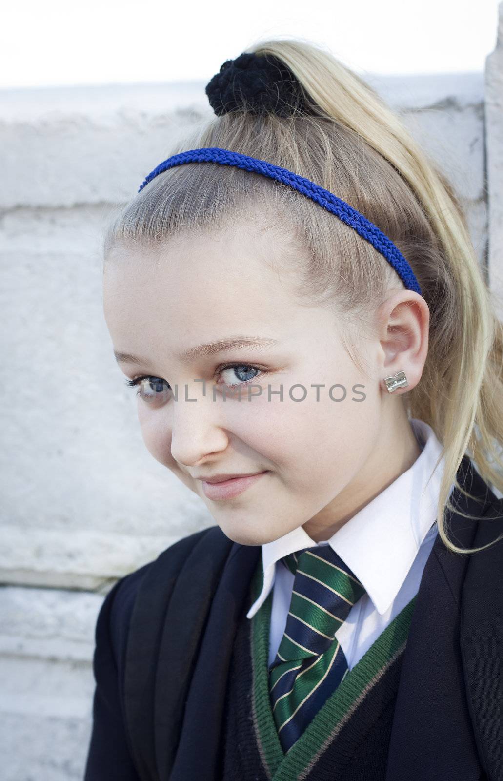 Student in school uniform looking at camera