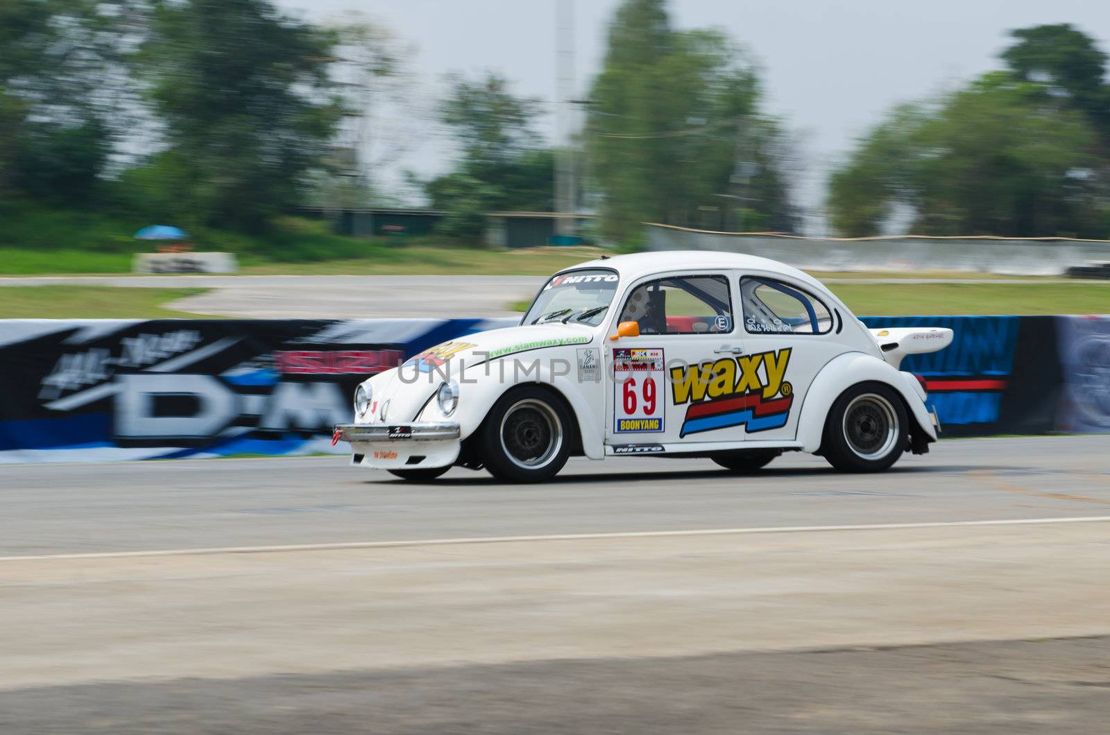 Nakhon Ratchasima, Thailand - March 9th:Unidentified car racing competitors during the "Thailand circuit 2013  " at Bonanza speedway on March 9th, 2013 in Nakhon Ratchasima, Thailand. 