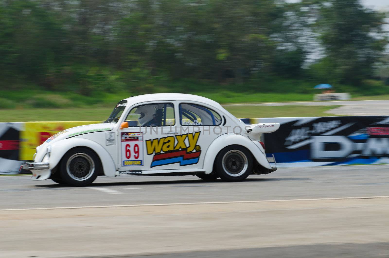 Nakhon Ratchasima, Thailand - March 9th:Unidentified car racing competitors during the "Thailand circuit 2013  " at Bonanza speedway on March 9th, 2013 in Nakhon Ratchasima, Thailand. 