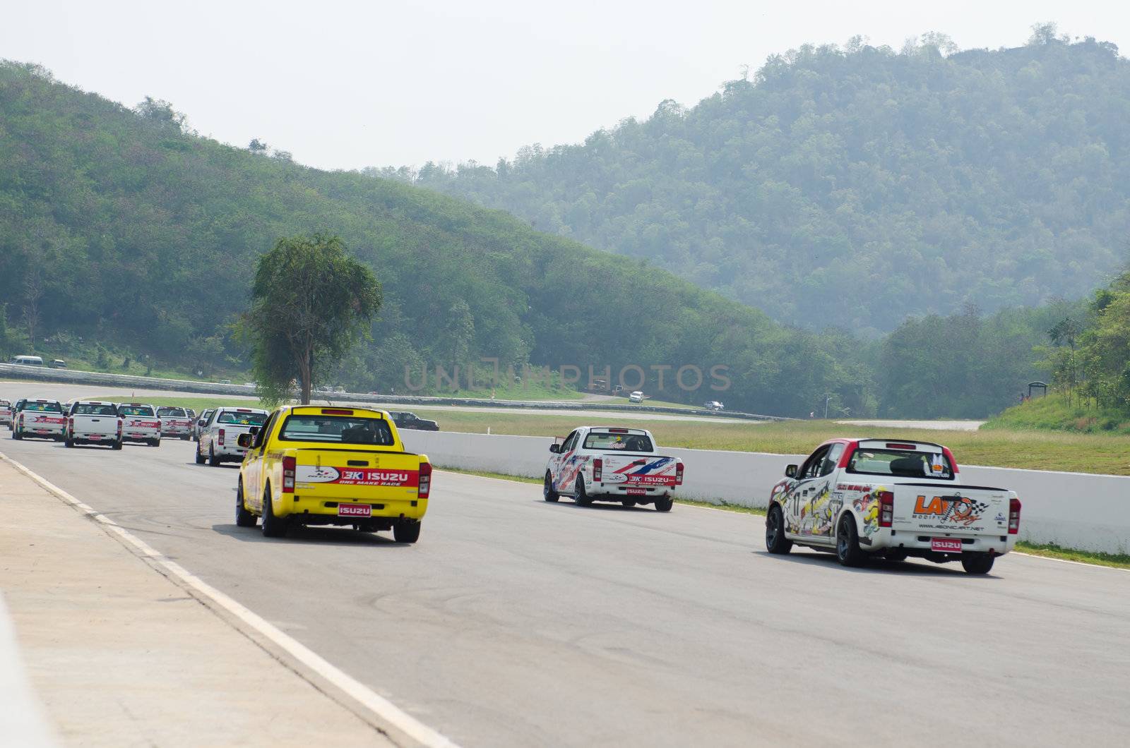 Nakhon Ratchasima, Thailand - March 9th:Unidentified car racing competitors during the "Thailand circuit 2013  " at Bonanza speedway on March 9th, 2013 in Nakhon Ratchasima, Thailand. 