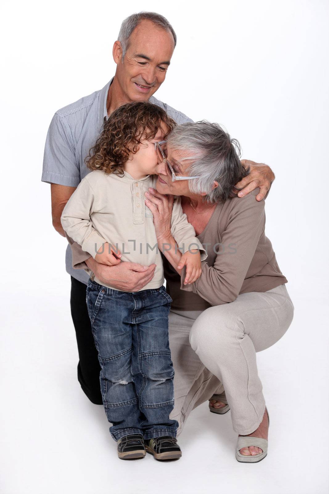 Grandparents with granddaughter by phovoir