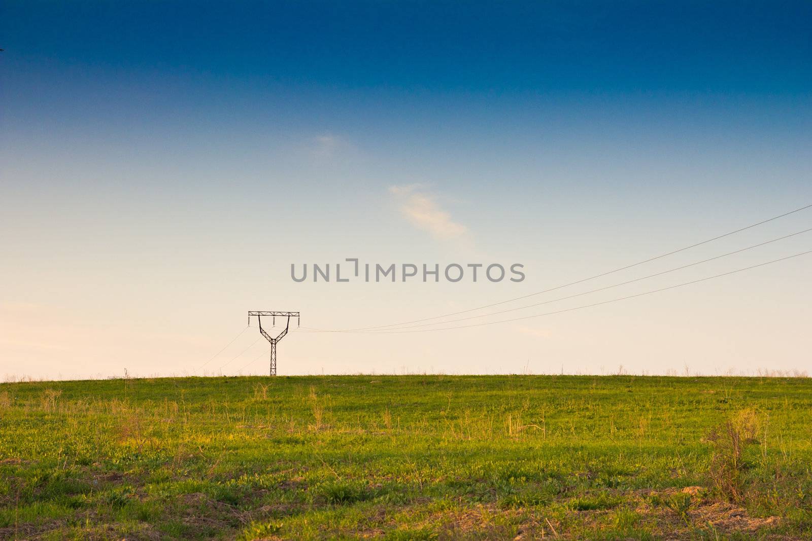 High-voltage column in steppe by schankz