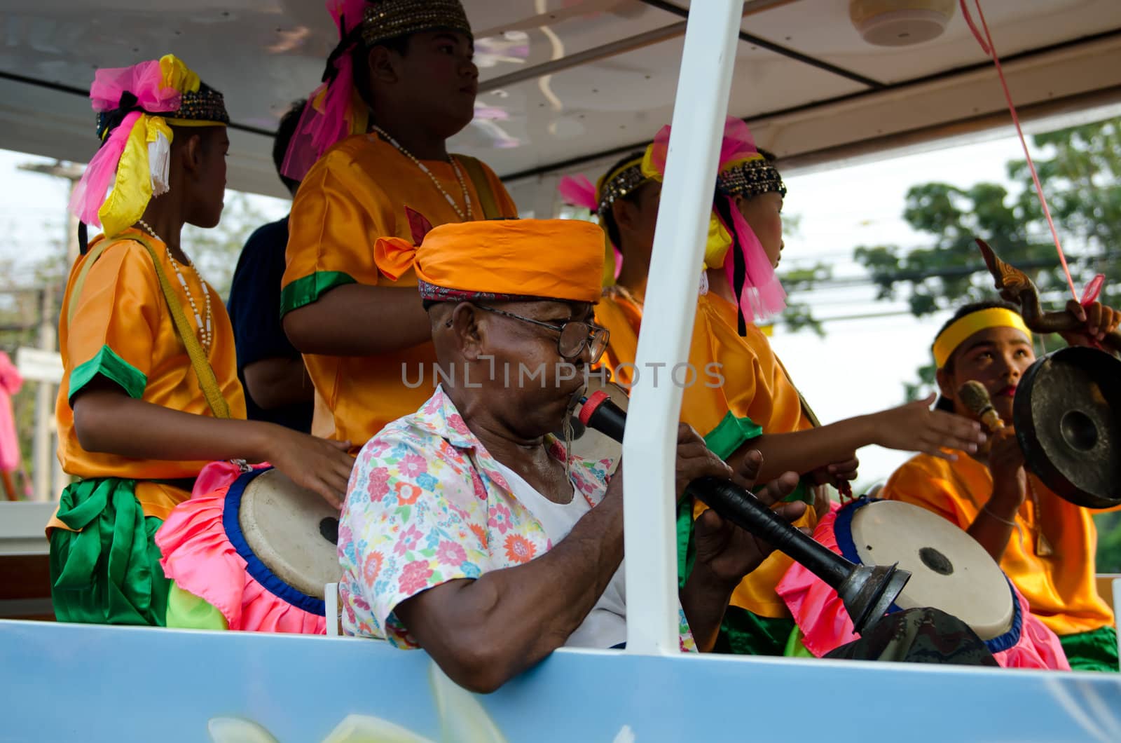 Phetchaburi, Thailand - March 28th:participants in Phranakhonkhiri festival parade 2013 on public street in front of Khao Wang  Phetchaburi on March 28th, 2013 in Phetchaburi Province, Thailand. 