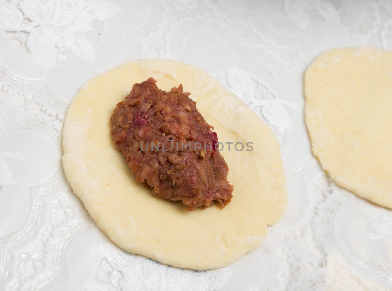 rolled out dough with jam