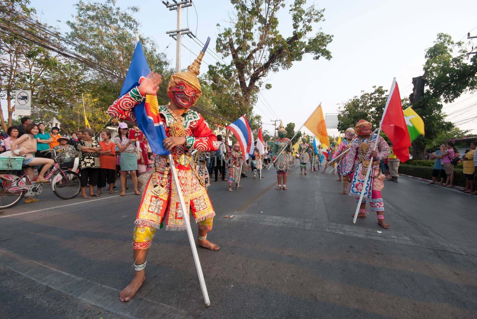 Phetchaburi, Thailand - March 28th:participants in Phranakhonkhiri festival parade 2013 on public street in front of Khao Wang  Phetchaburi on March 28th, 2013 in Phetchaburi Province, Thailand. 