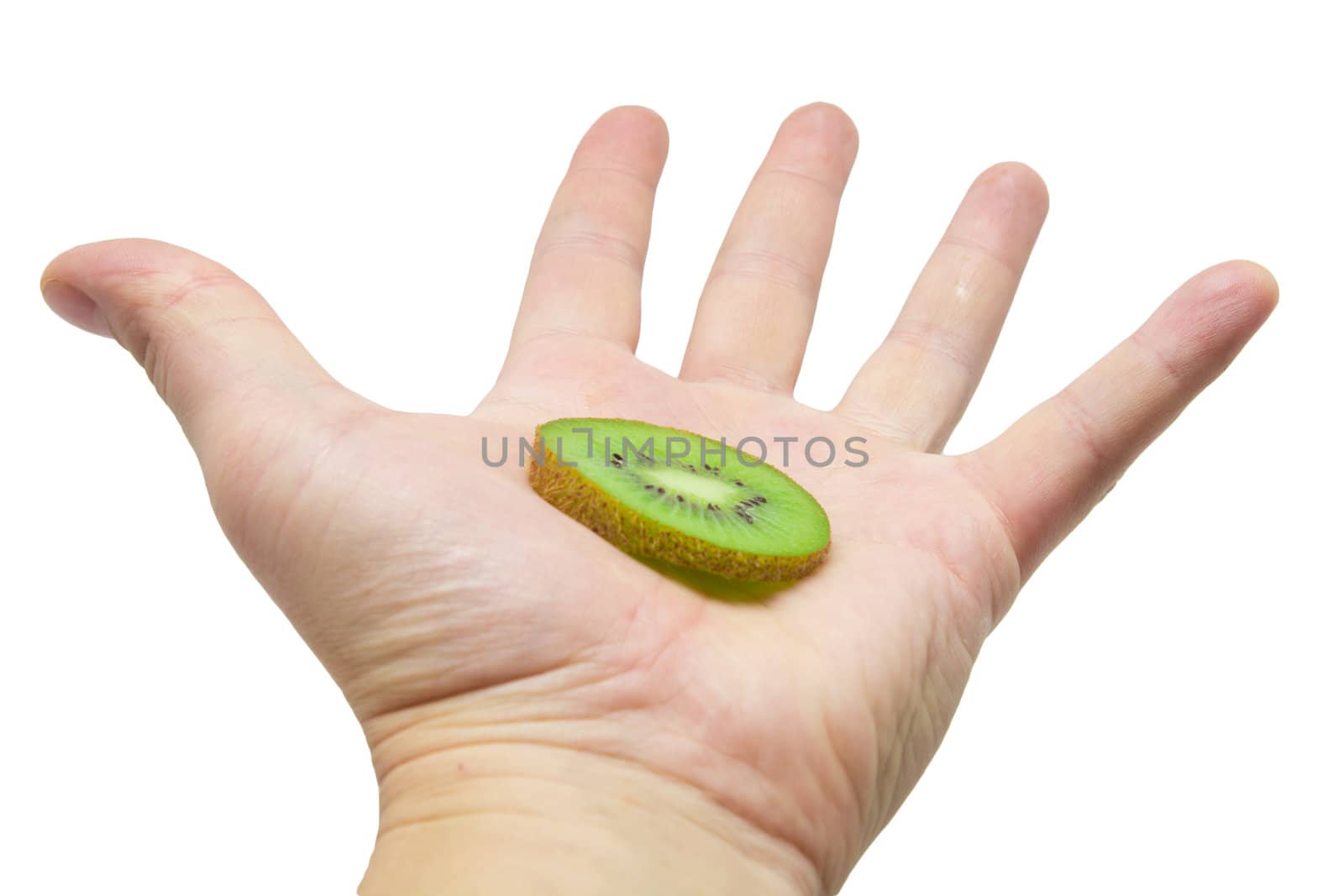 kiwi  in a hand on a white background