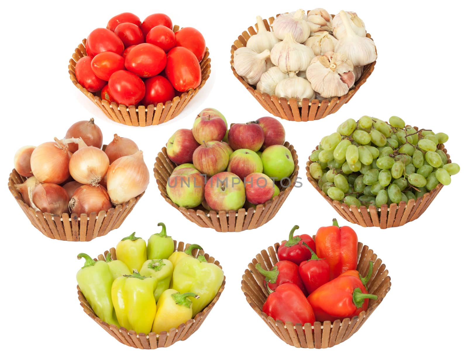 tomato, onion, garlic, peppers, apples and grapes on a white background