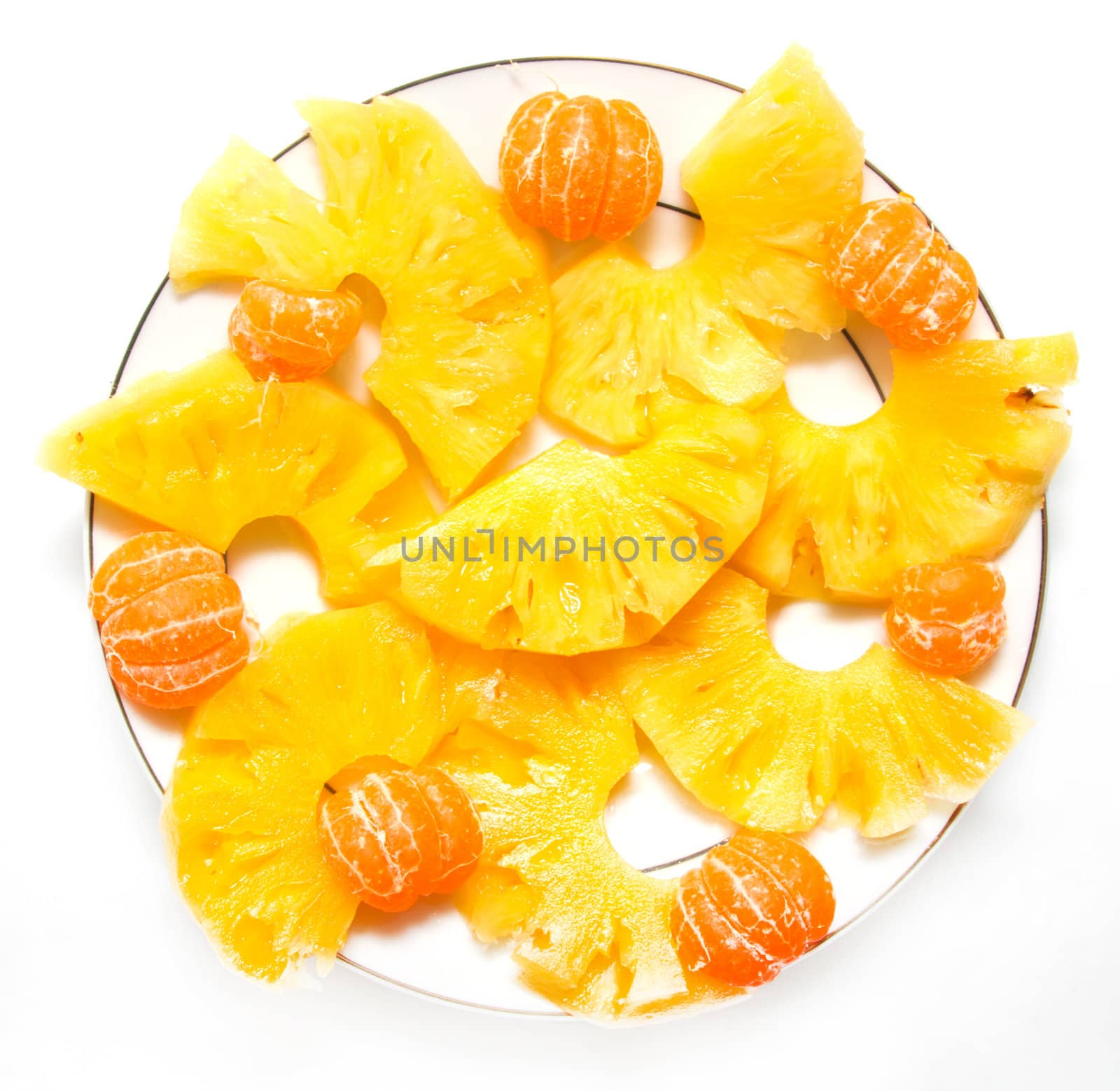 tangerines with pineapple on a white background