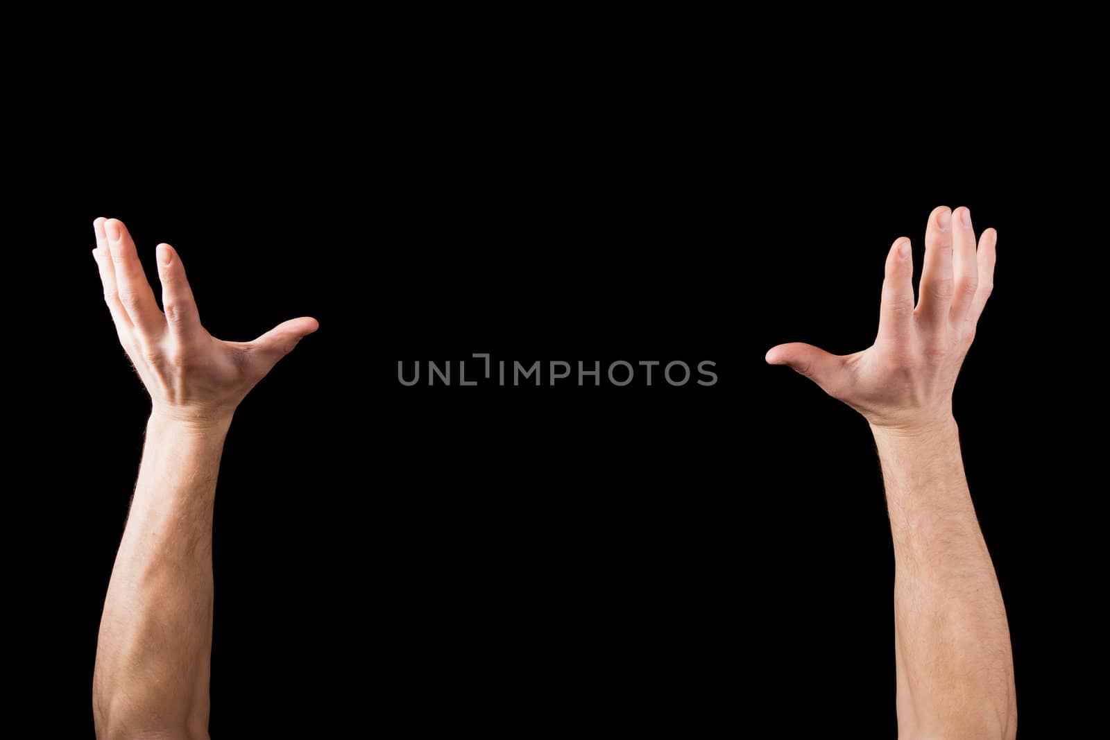 Hands up in the air like holding something isolated on black background