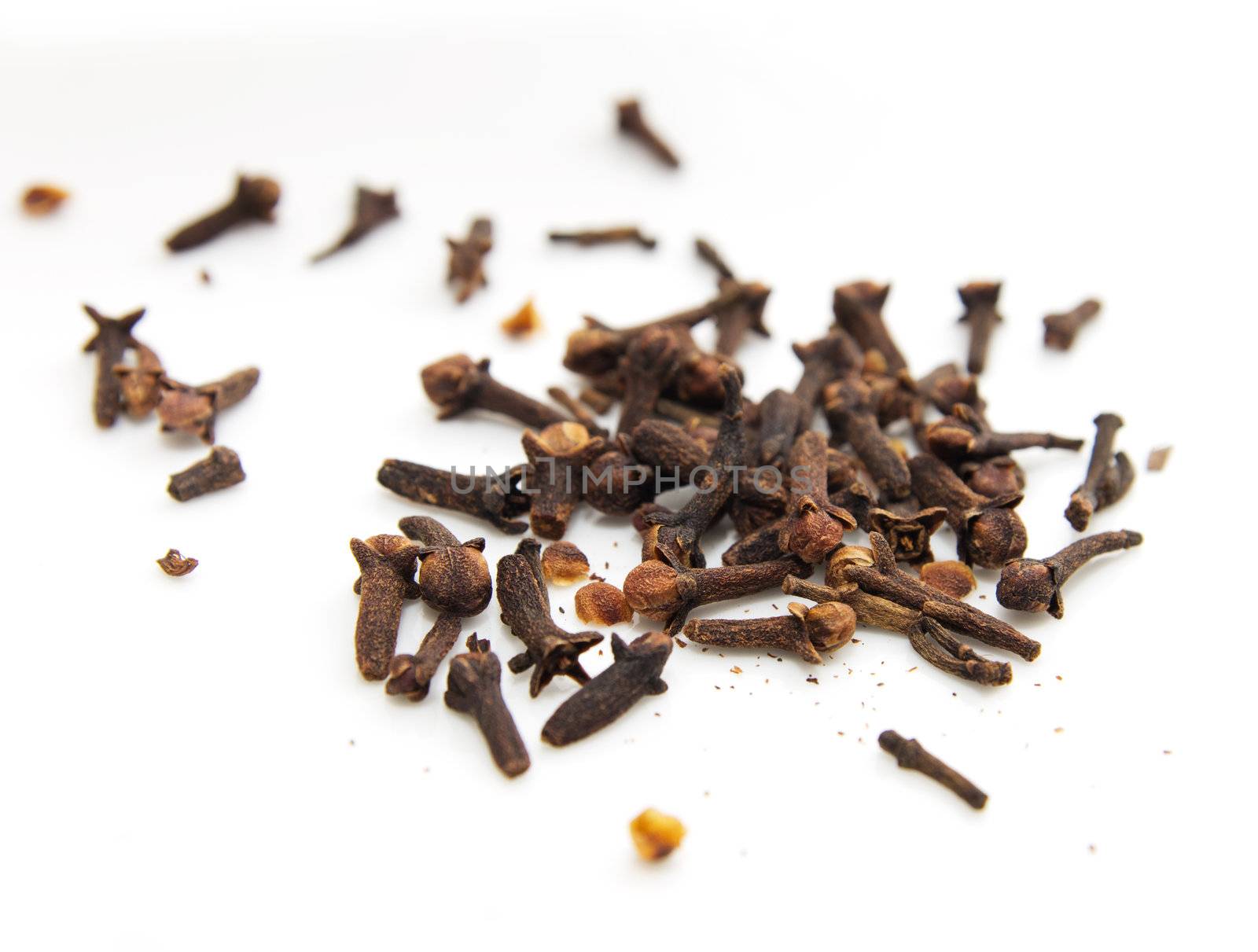 Dried cinnamon on a white background